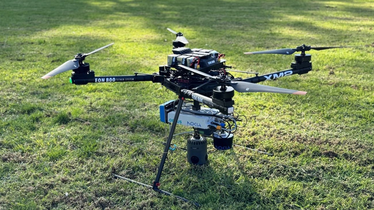 A drone sitting on the grass