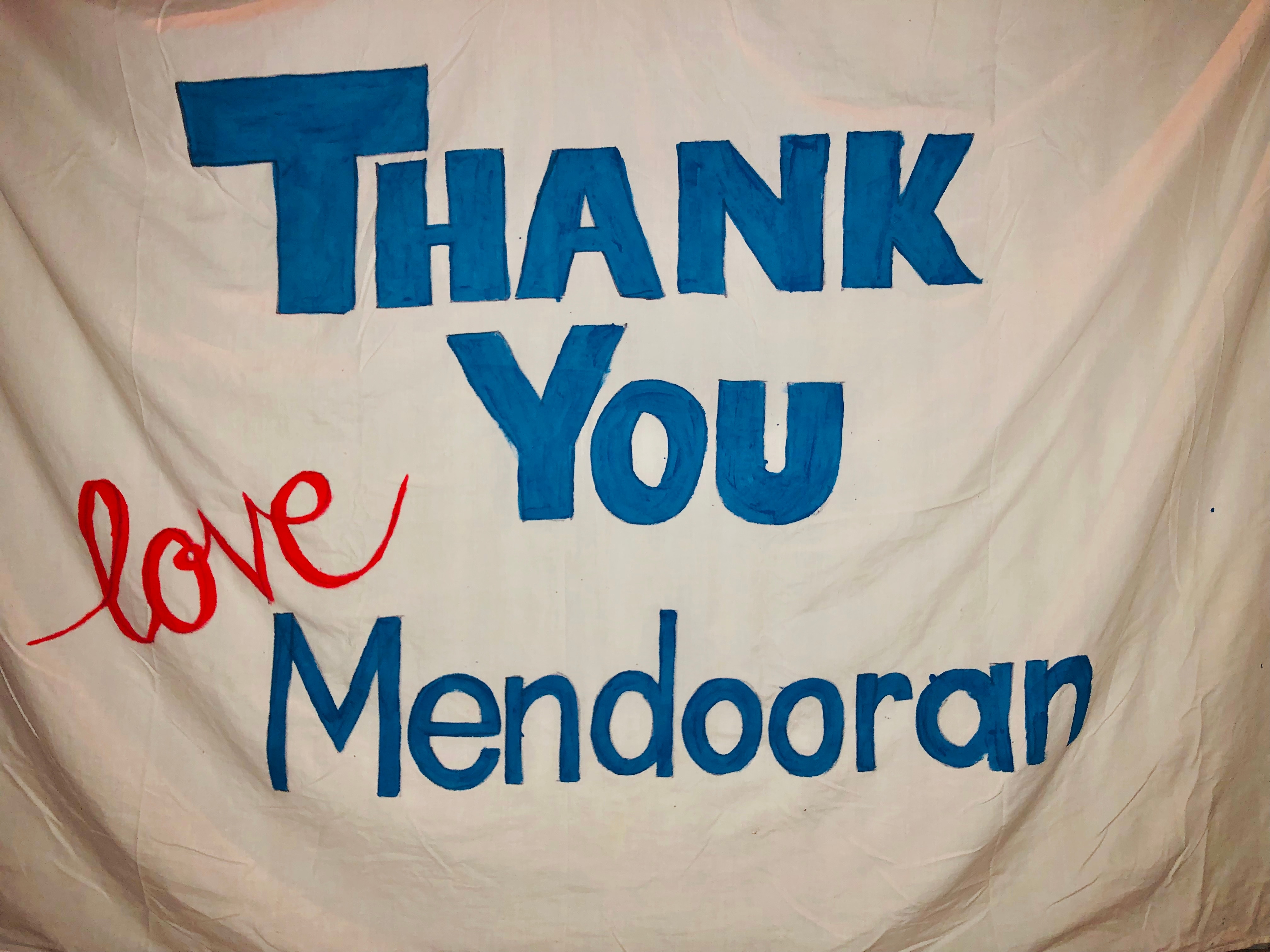 Sign reads: Thank you Love Mendooran