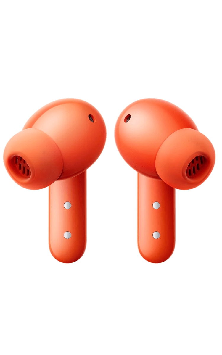 A pair of Nothing CMF Buds 2 wireless earbuds in orange, shown from the reverse angle. The earbuds have smooth, rounded orange ear tips and slim, matching stems with small circular holes for the speakers. The stems feature minimalist dot details, contributing to the modern, clean design of the earbuds. The overall look is fresh and contemporary.