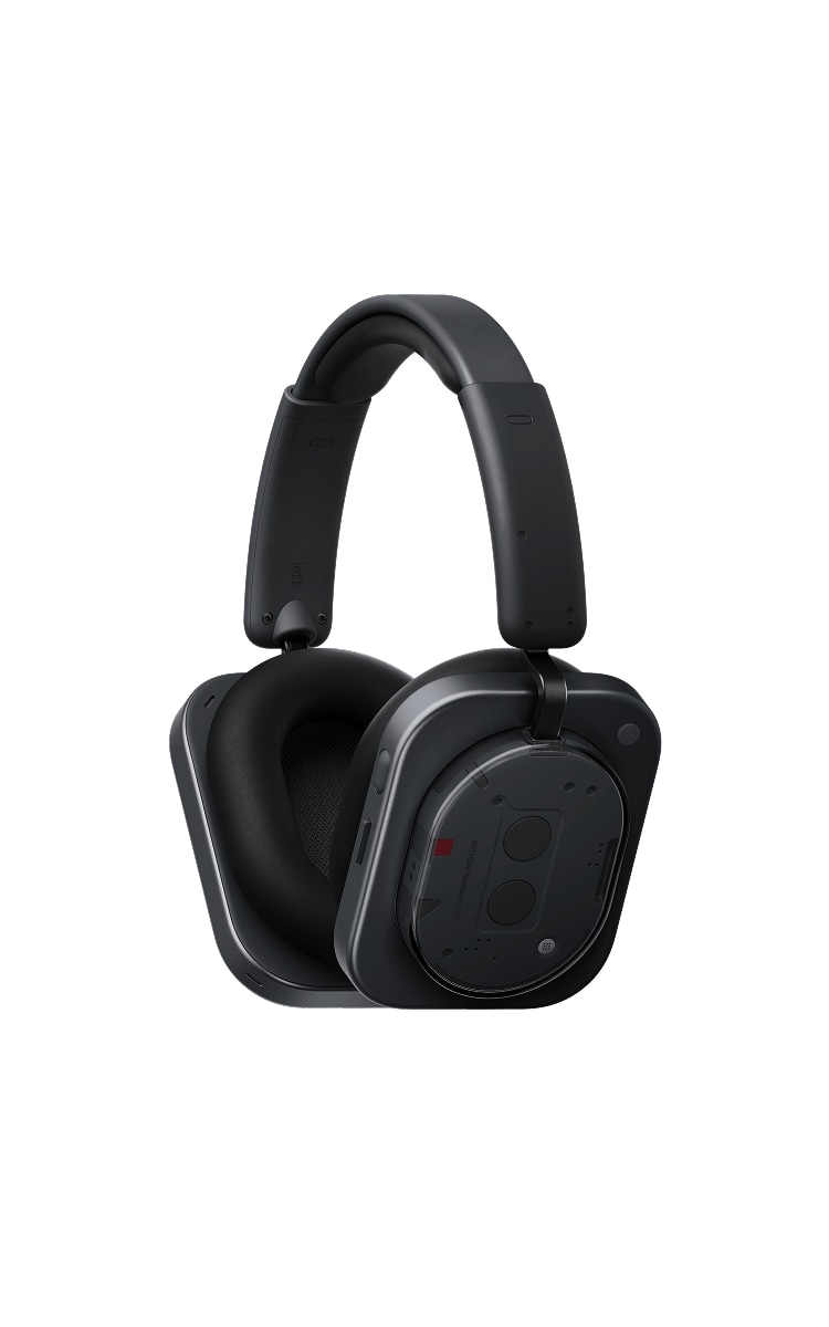 The image shows a pair of Nothing headphones (1) in a sleek black colour. The headphones feature a large, padded ear cup design with a clean, minimalistic look. The left ear cup displays buttons and a dial for adjustments, and the headband is padded for comfort. The overall design is high-tech, with visible screws and details on the back of the ear cups.