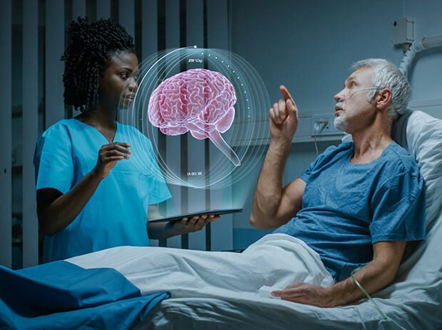 Doctor with an iPad projecting a hologram of a brain to a patient