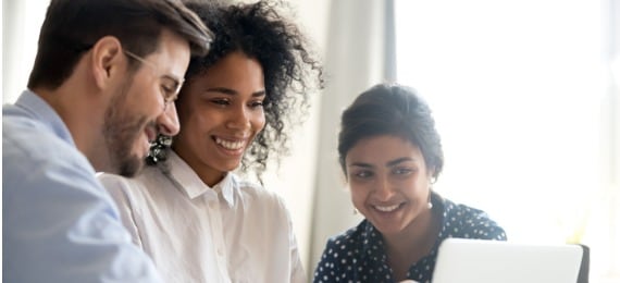 Happy people looking at a connected device screen