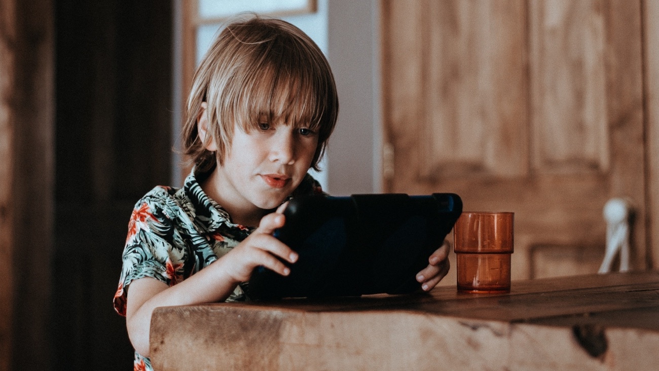 Child looking at tablet screen