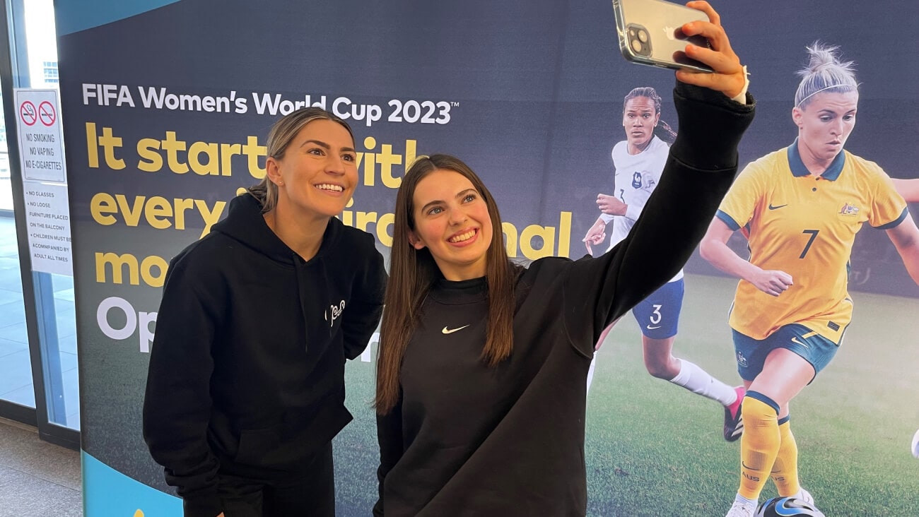 Steph Catley and a fan take a selfie
