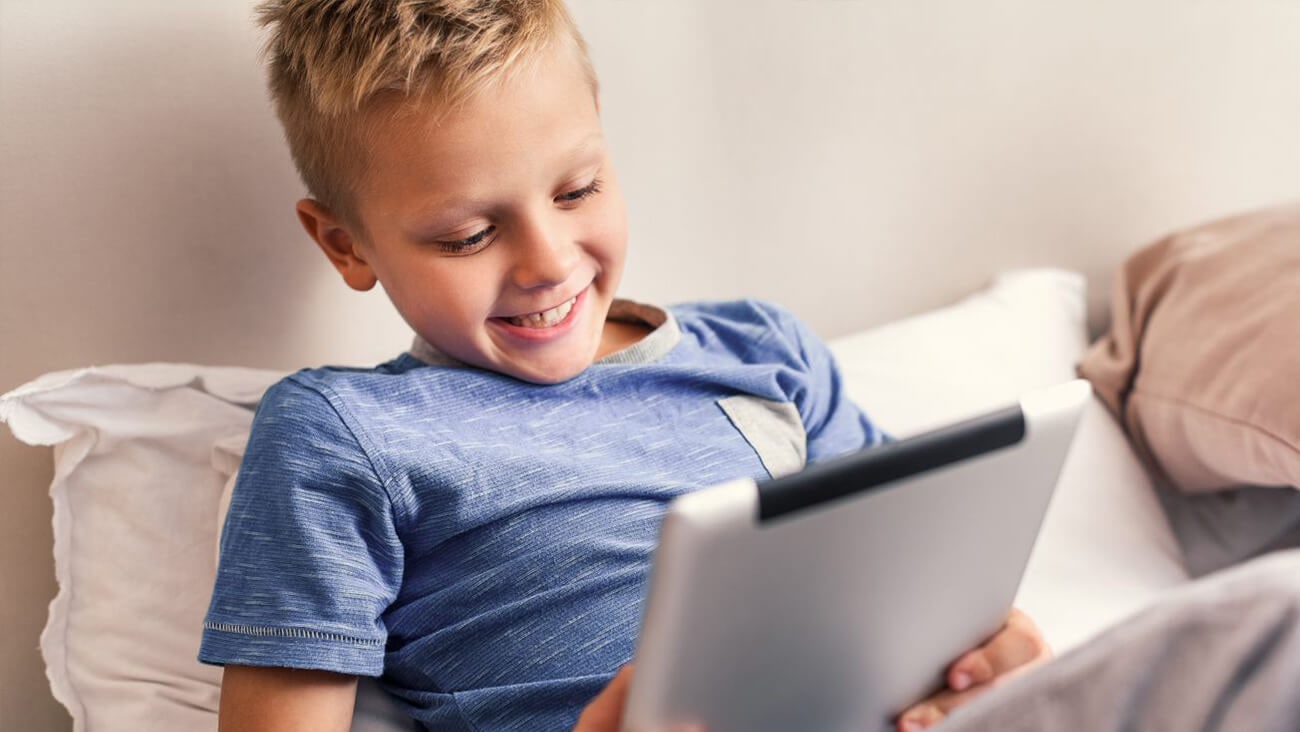Boy looking at tablet