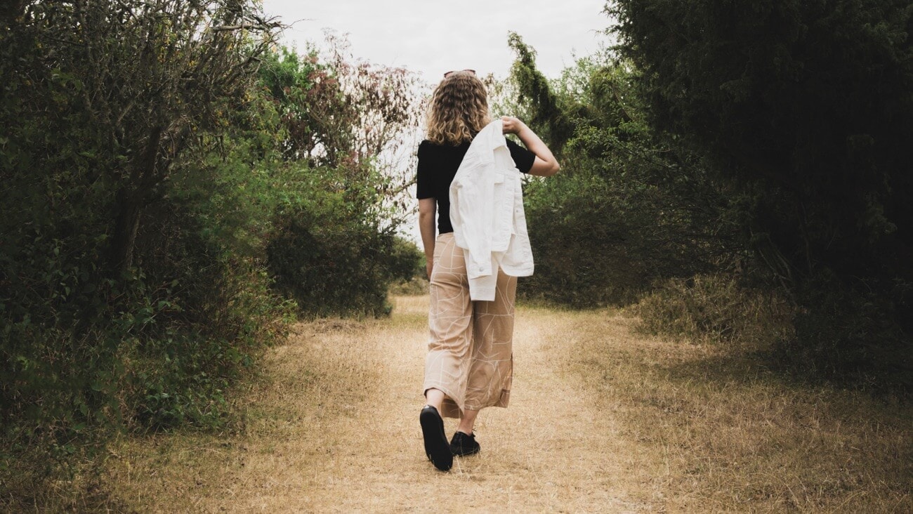 A woman walking in the bush