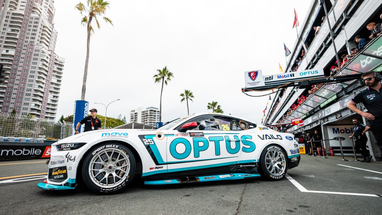 Mobil 1 Optus Racing car in the foreground with Gold Coast street scene in the rear