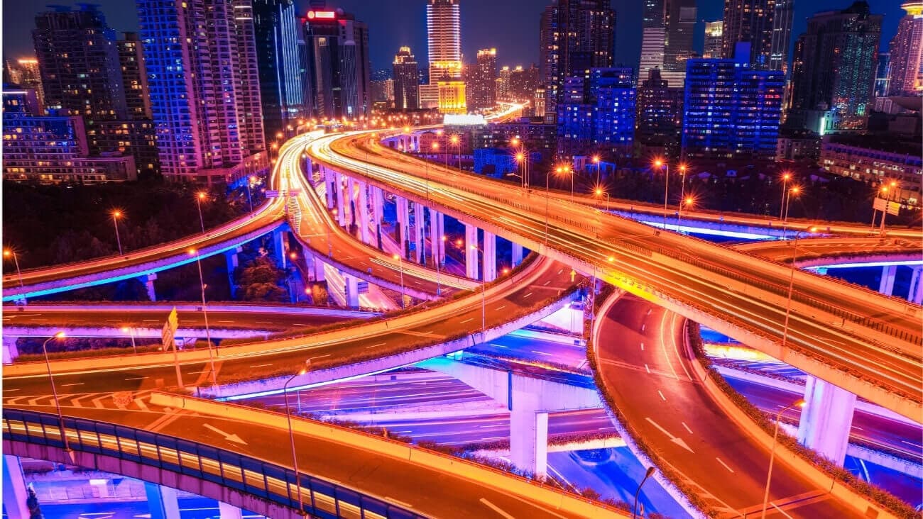 complex system of highways lit up at night