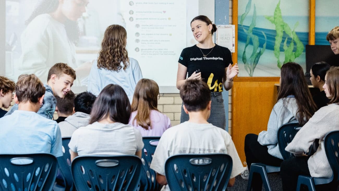 A Digital Thumbprint facilitator teaches students about digital safety in a workshop