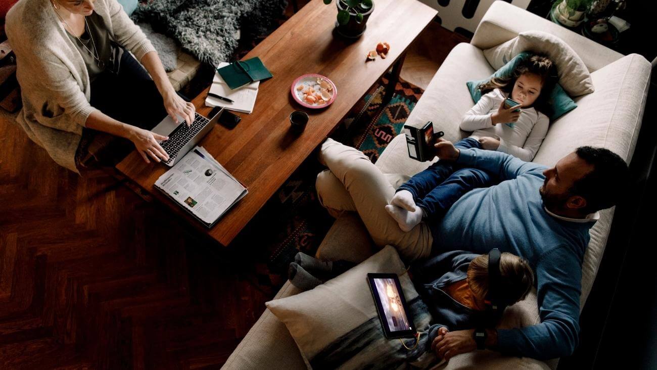 A connected family spends time together at home