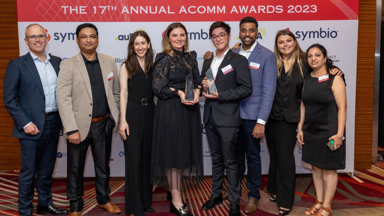 Group photo of the Optus winners of two ACOMM Awards 2023