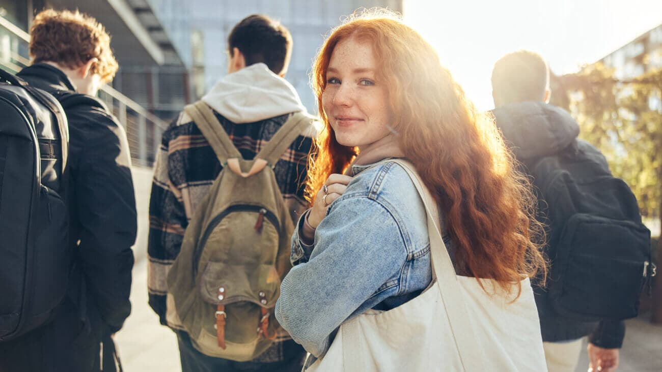 Young female university student and fellow student