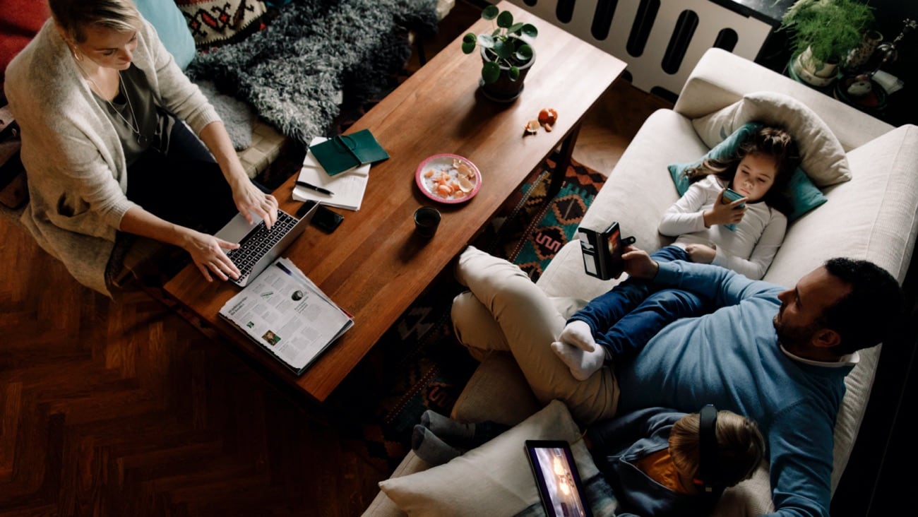 A family using various devices